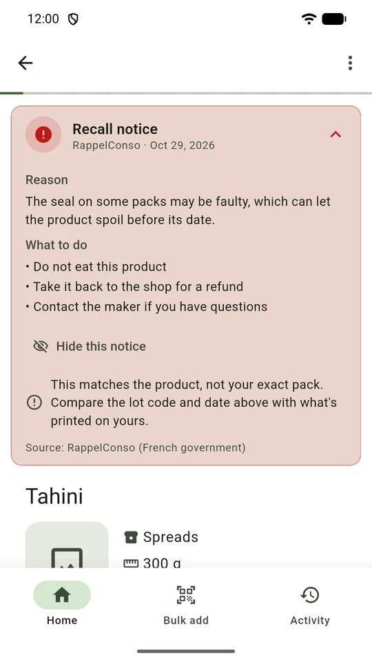 A recall notice on a jar of tahini, with the reason for the recall and what to do